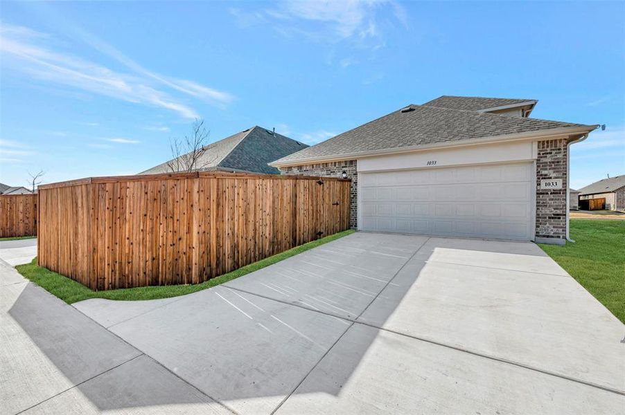 Exterior details and patio area of a home in Tarrytown, Crowley (Image 21).