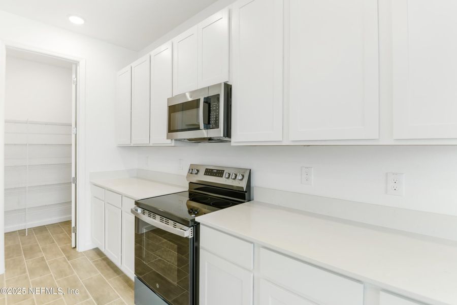 Furnished interior view inside a new home in Seasons at Grandview Gardens, Deland (Image 8).