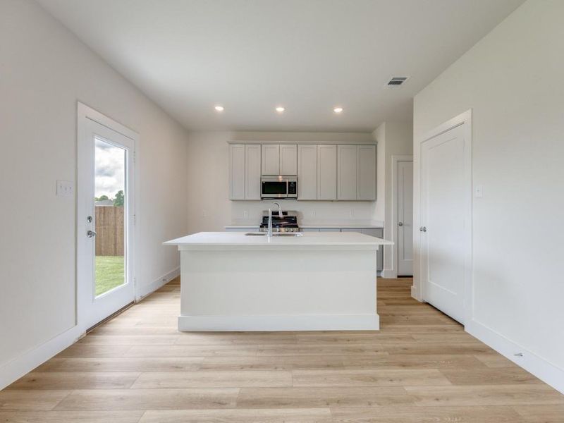 Furnished interior view inside a new home in Pebblebrook, Sherman (Image 4).