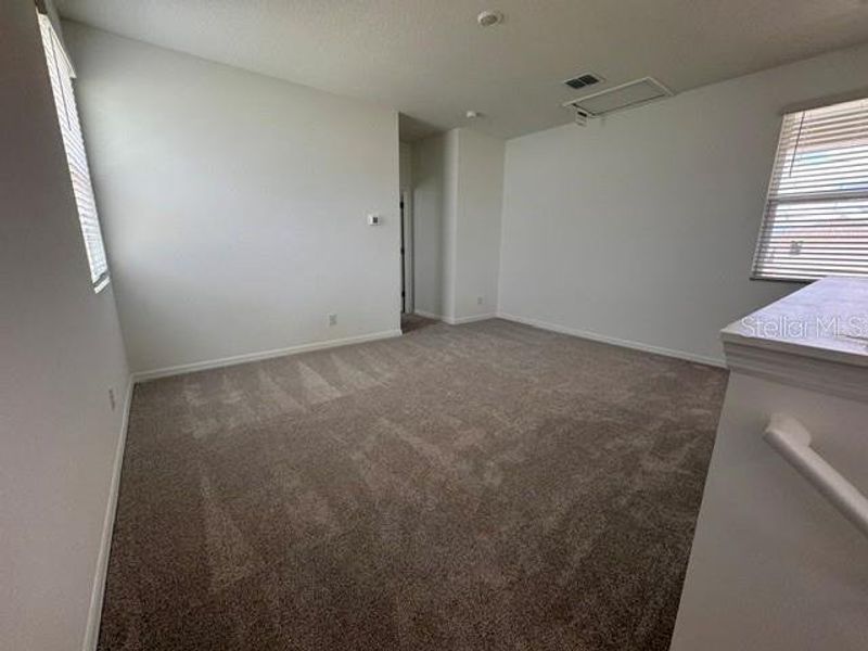 Spacious, unfurnished interior of a new home in Cypress Bluff, Groveland (Image 4).
