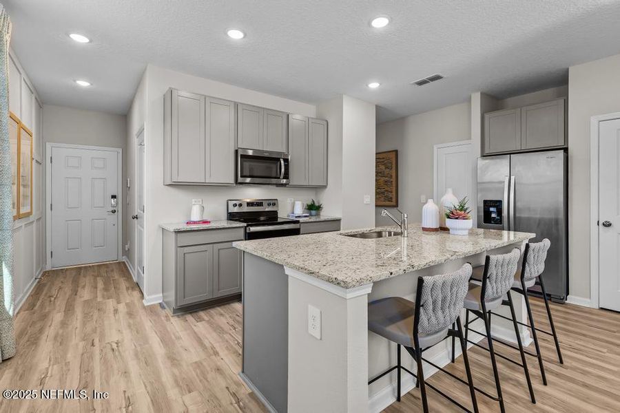 Furnished interior view inside a new home in Palm Series at The Landings at Pecan Park, Jacksonville (Image 15).