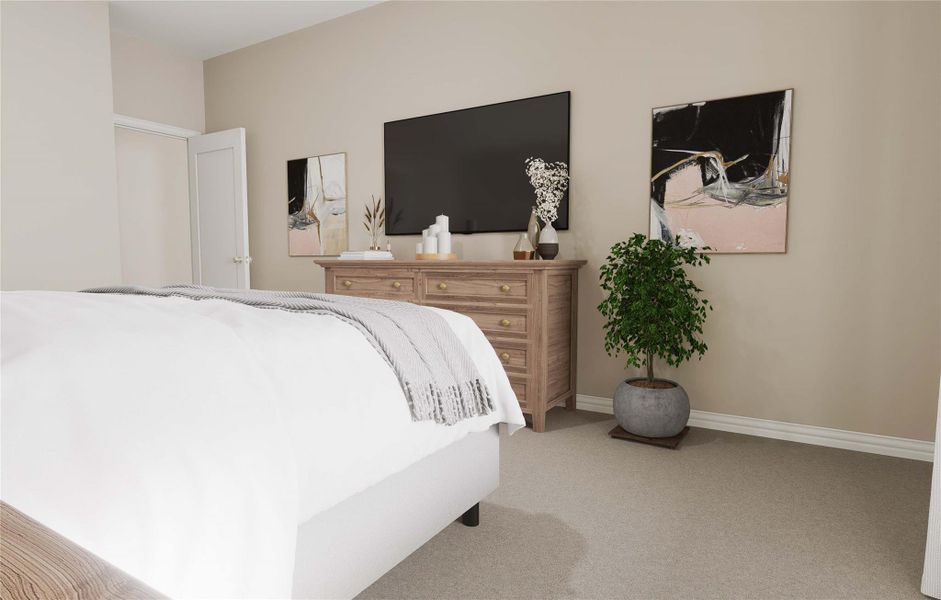 Carpeted bedroom featuring baseboards