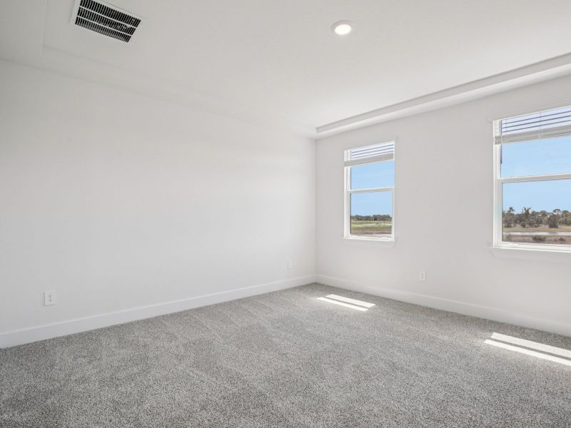 Spacious, unfurnished interior of a new home in Magnolia Bay - Reserve Series, Nokomis (Image 14).