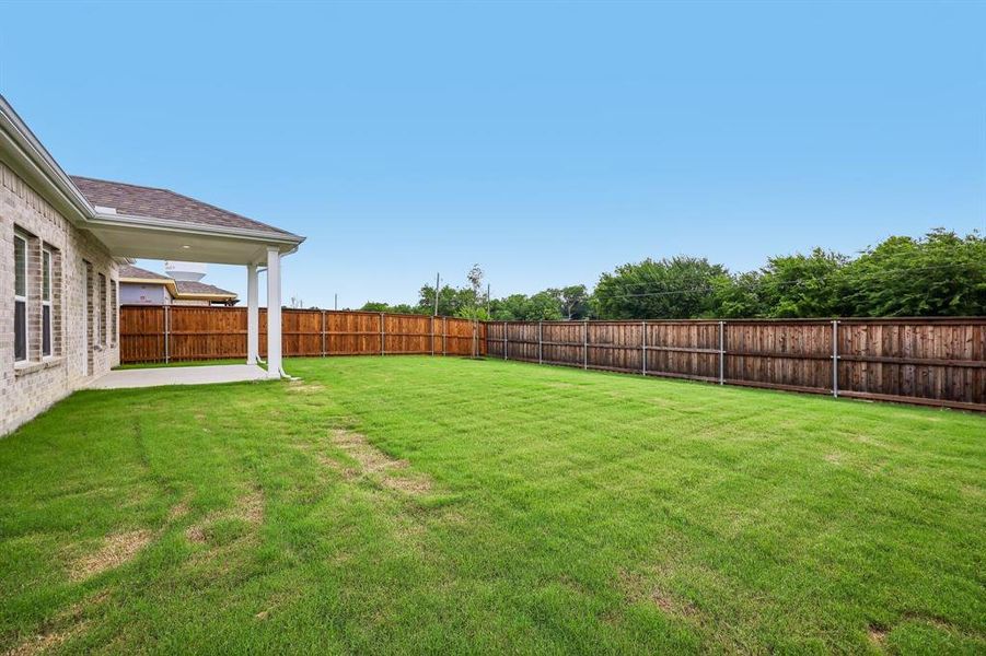 Exterior details and patio area of a home in Overland Grove, Forney (Image 3).