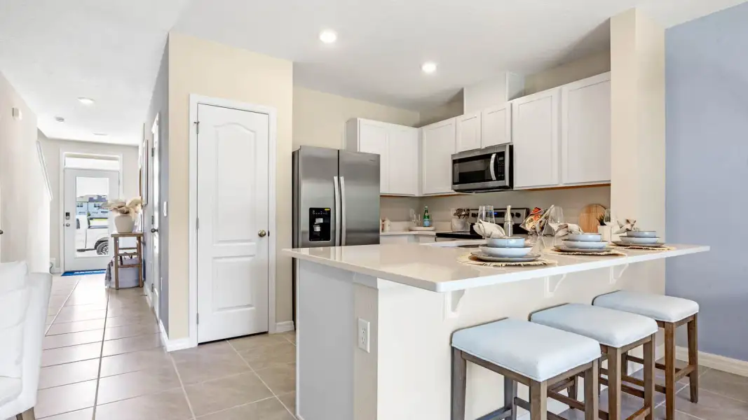 Representative furnished interior of a home built from the Pearson by D.R. Horton in Hawthorne Ranch Townhomes, Lakeland (Image 11).