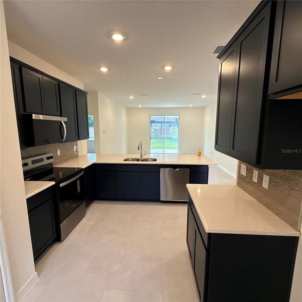 Furnished interior view inside a new home in Palm Coast: Value Collection, Palm Coast (Image 5).