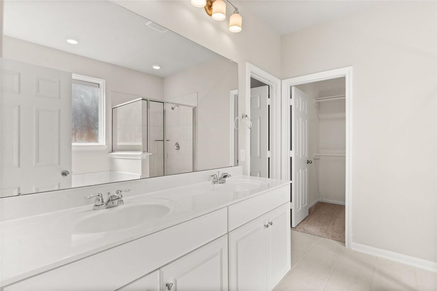 Furnished interior view inside a new home in Spring Creek Trails, Magnolia (Image 5).