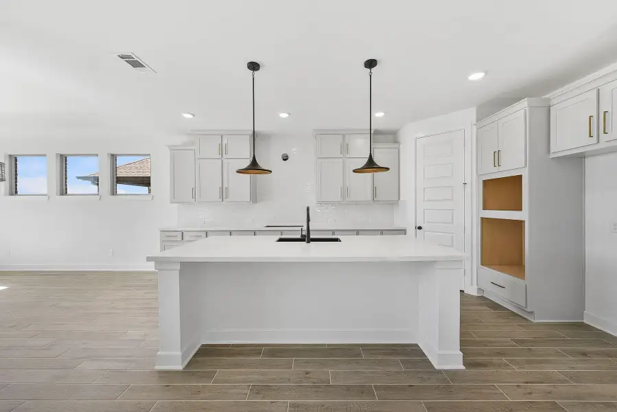 Furnished interior view inside a new home in Meridiana, Manvel (Image 4).