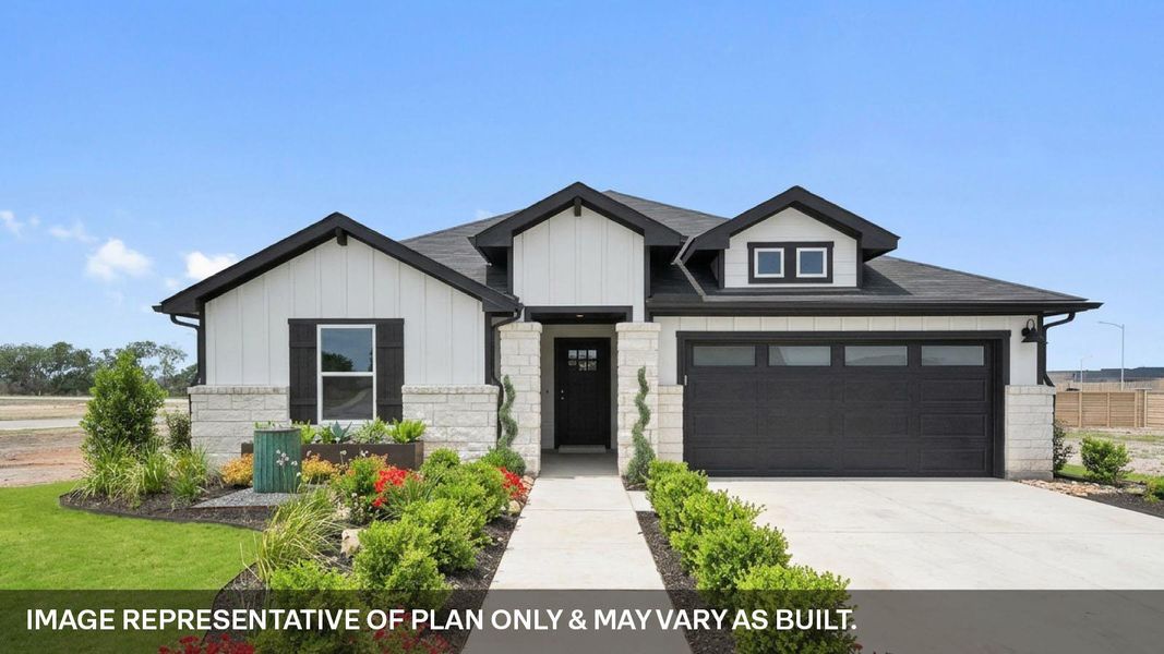 Front exterior of a new home in Monarch Ranch, Manor, TX, highlighting curb appeal (Image 1). Front exterior of a new home in Monarch Ranch, Manor, TX, highlighting curb appeal (Image 1).