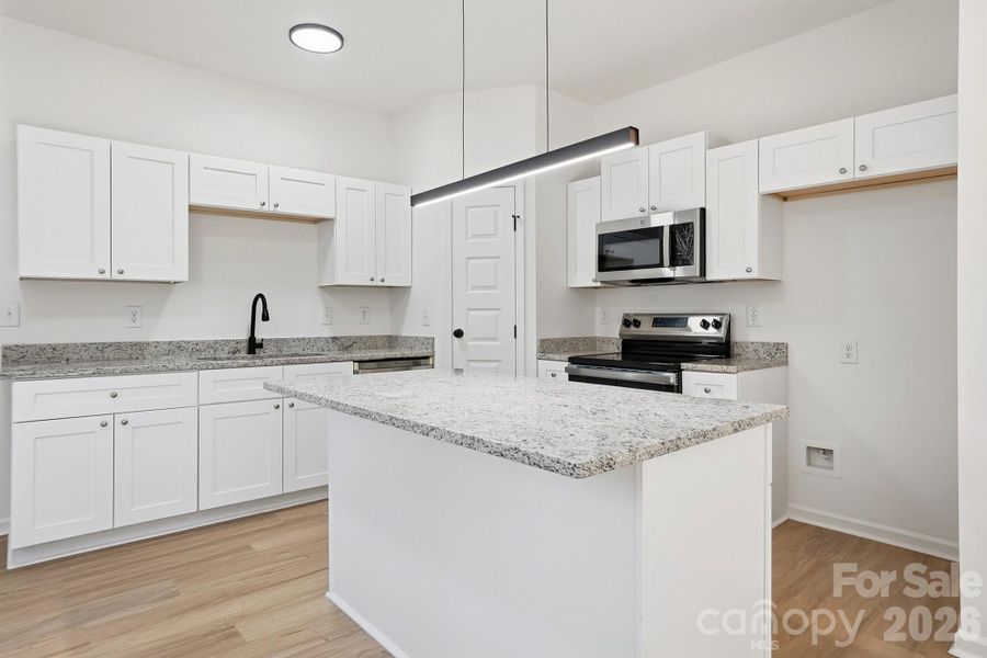 Furnished interior view inside a new home in , Wadesboro (Image 7).