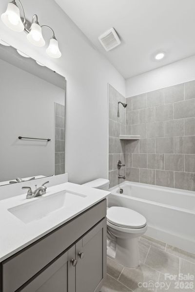 2nd floor hall bath with tile wall tub/shower