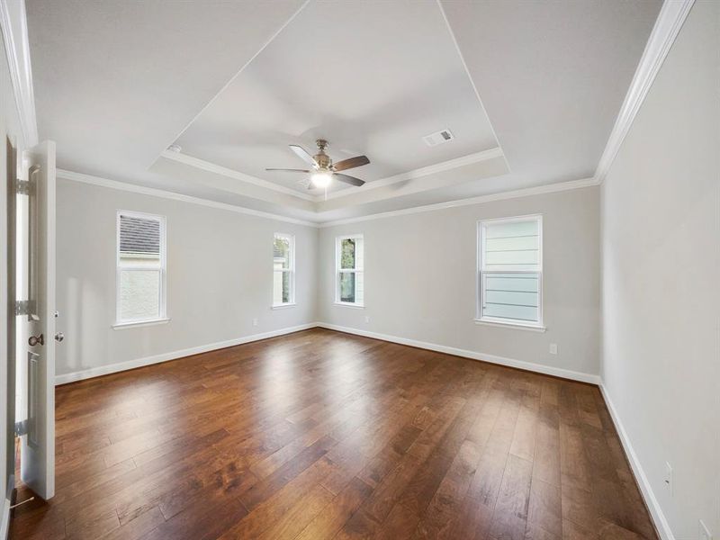 The Primary Bedroom, which features an abundance of light, is extremely spacious. The bedroom comfortably fits a king-sized bed and still allows plenty of room to play with. (Sample photo of a completed Sterling Floor Plan. Image may show alternative features/and or upgrades.)