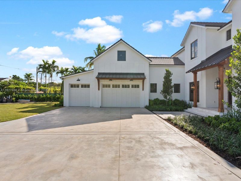 Front exterior of a new home in , Miami, FL, highlighting curb appeal (Image 29).