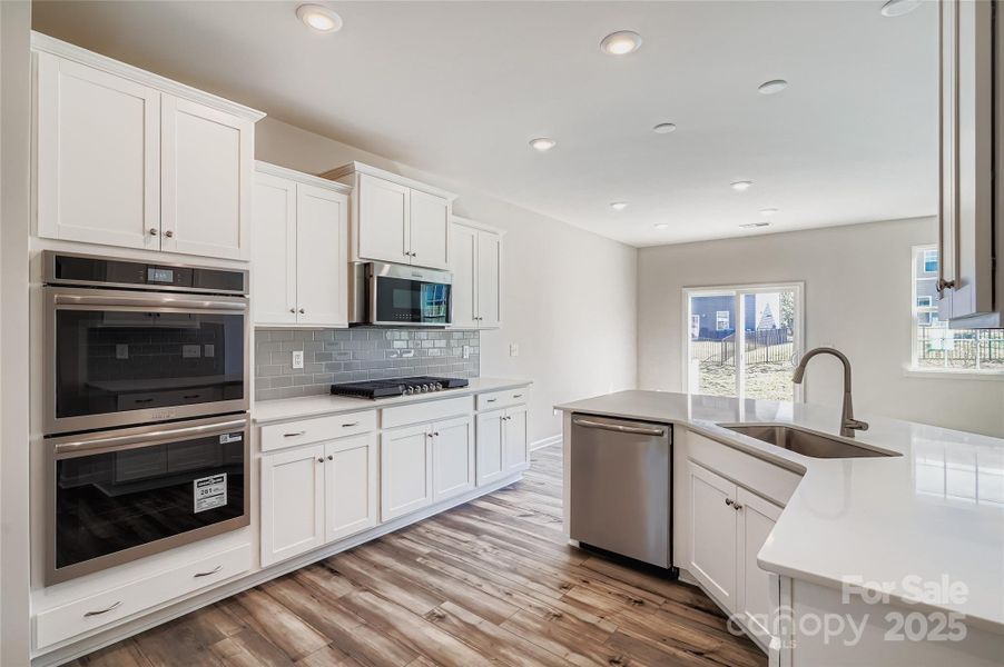 Furnished interior view inside a new home in Shannon Woods: Walk & Enclave, Maiden (Image 7).