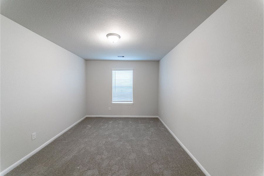 Spacious, unfurnished interior of a new home in Canterra Creek, Rosharon (Image 38).