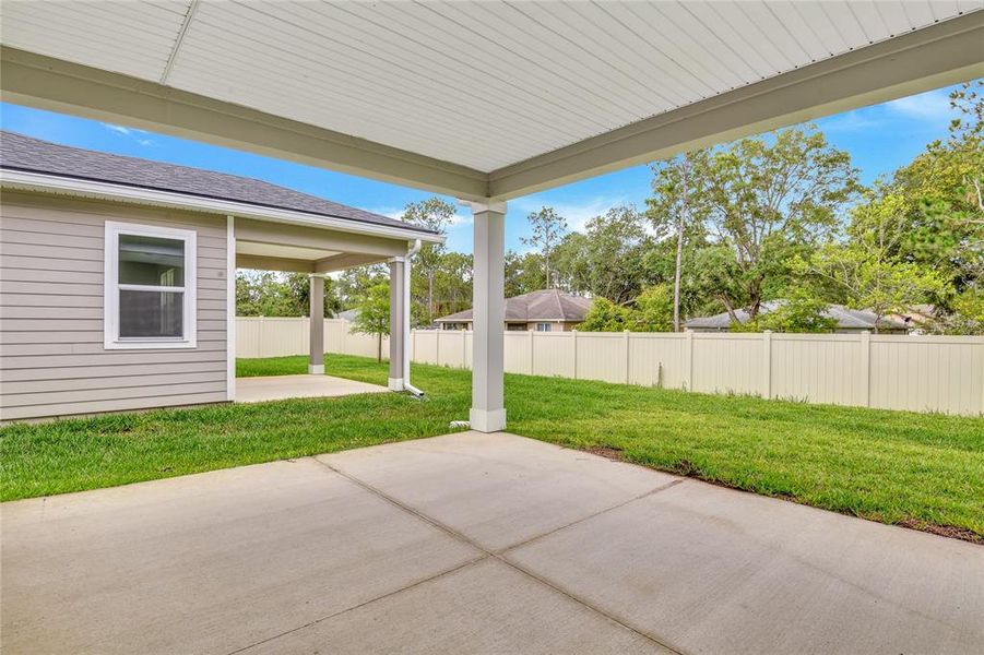 Exterior details and patio area of a home in Seminole Palms, Palm Coast (Image 16).