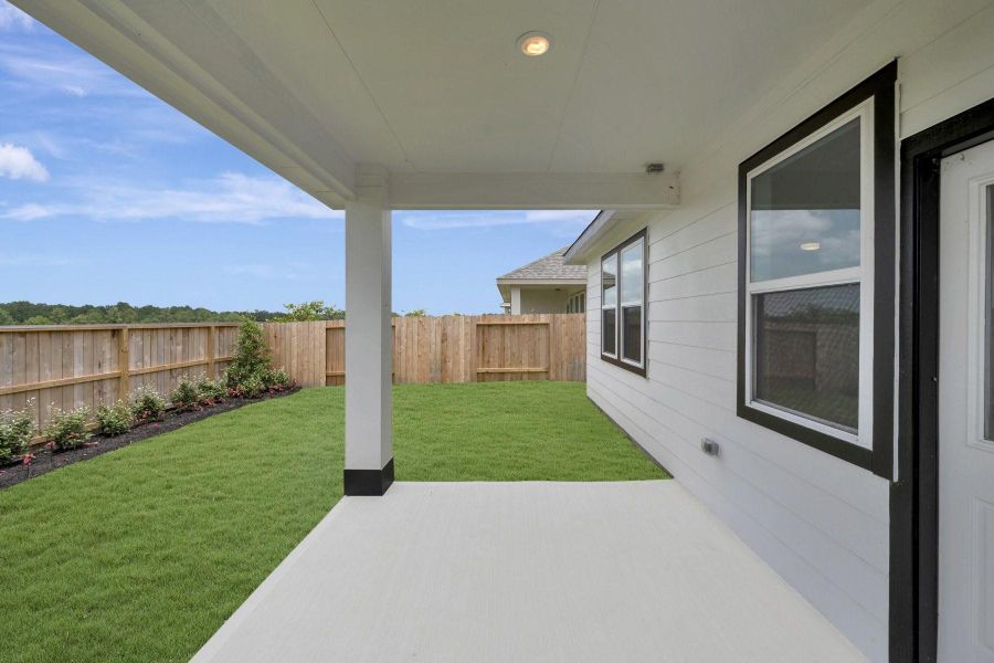 Relax outdoors on the covered patio Relax outdoors on the covered patio