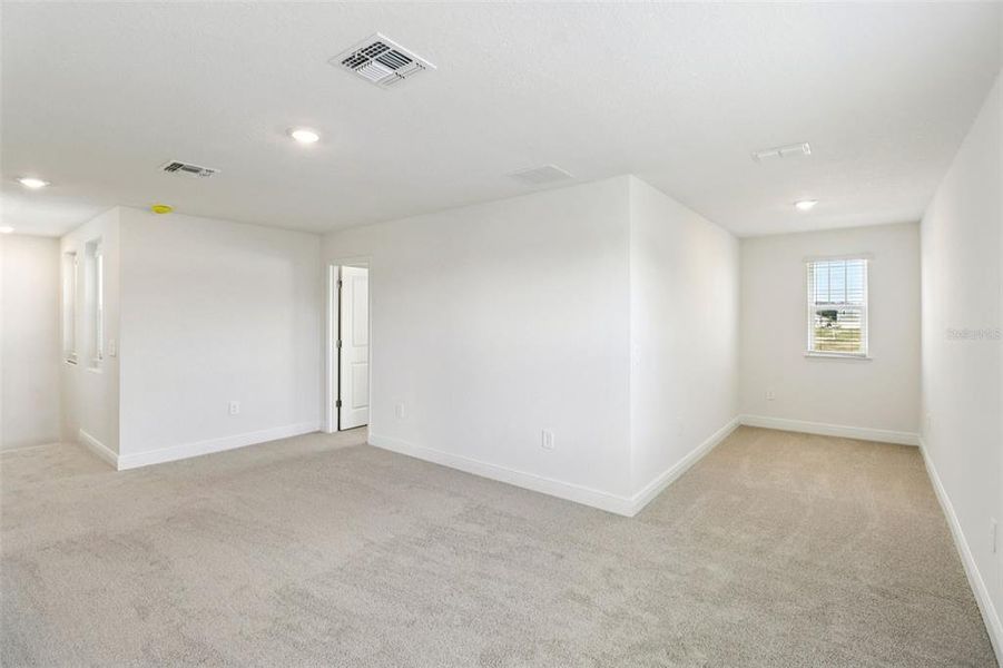 Spacious, unfurnished interior of a new home in The Reserve at Hammock Oaks - Classic Series, Lady Lake (Image 28).