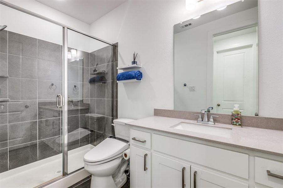 Full first floor bathroom just outside the first floor guest bedroom with a large shower and sizeable vanity! Full first floor bathroom just outside the first floor guest bedroom with a large shower and sizeable vanity!