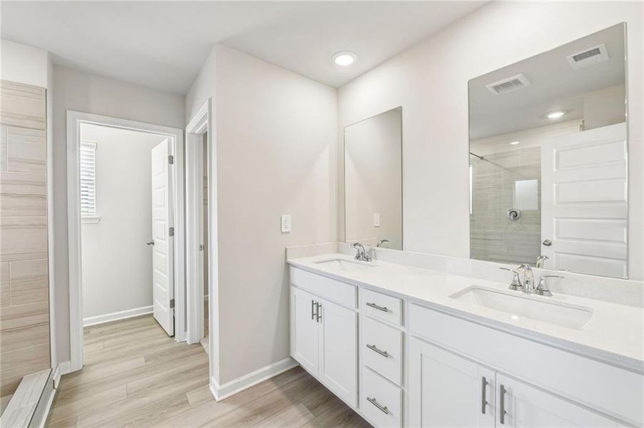 Furnished interior view inside a new home in Hemingway - Reserve Series, Cumming (Image 7). Furnished interior view inside a new home in Hemingway - Reserve Series, Cumming (Image 7).