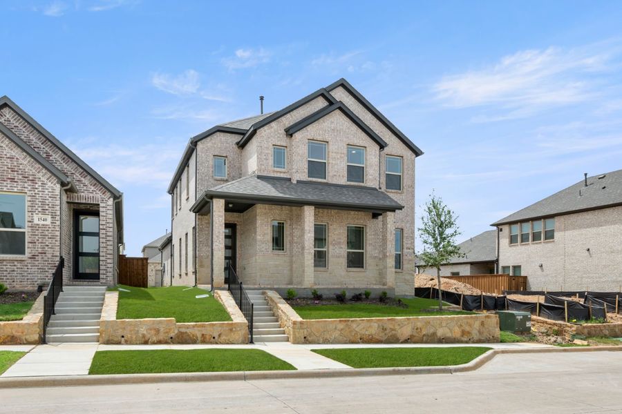 Representative exterior photo of a completed home built from the Aspen by Windsor Homes in Walton Ridge, Corinth, TX (Image 2). Representative exterior photo of a completed home built from the Aspen by Windsor Homes in Walton Ridge, Corinth, TX (Image 2).