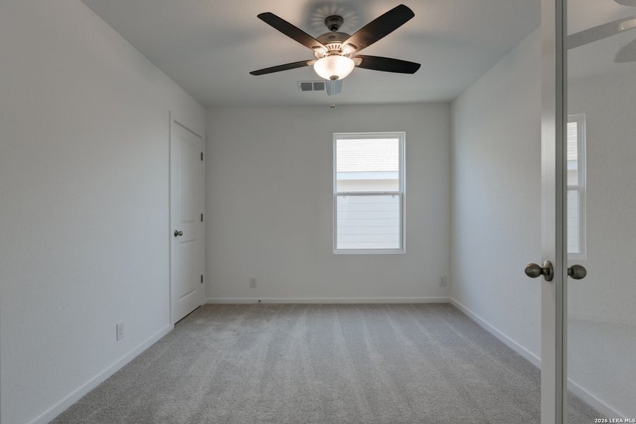 Spacious, unfurnished interior of a new home in Hennersby Hollow, San Antonio (Image 25).