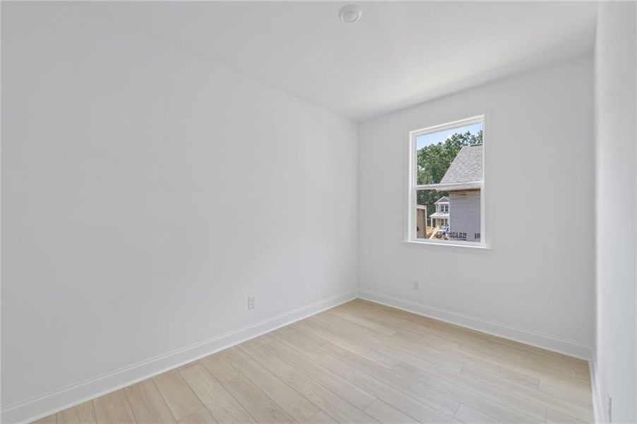 Spacious, unfurnished interior of a new home in Bailey Fence, Dacula (Image 54).