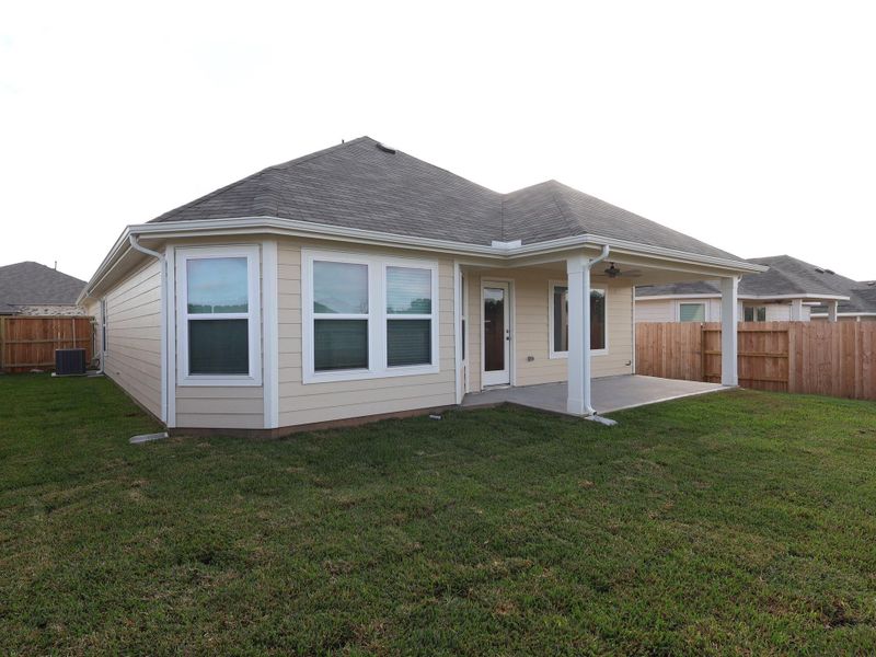 Exterior details and patio area of a home in Moran Ranch, Willis (Image 19).