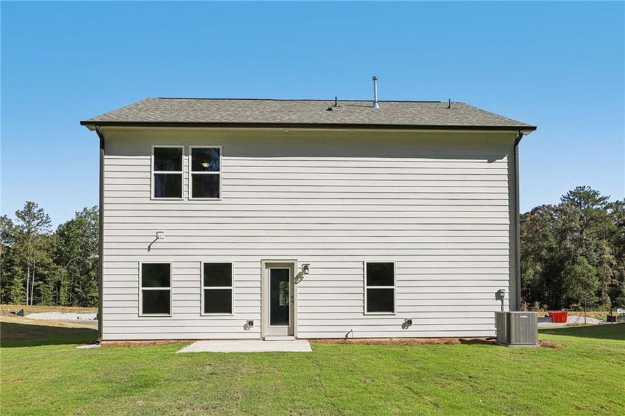 Exterior details and patio area of a home in The Pointe at Heron Bay, Locust Grove (Image 4).