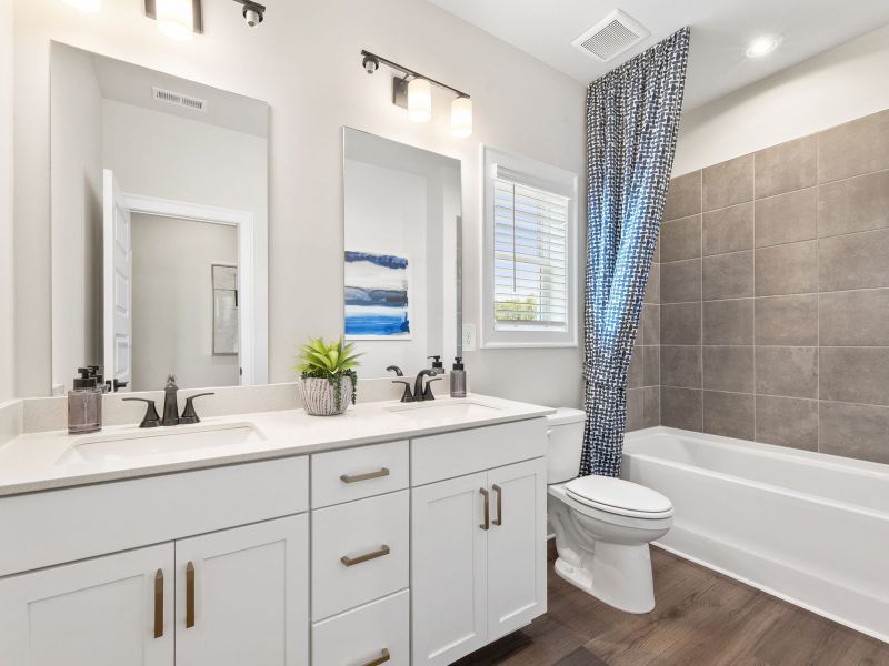 Furnished interior view inside a new home in Vines at Mill Creek - Legacy Series, Braselton (Image 21). Furnished interior view inside a new home in Vines at Mill Creek - Legacy Series, Braselton (Image 21).