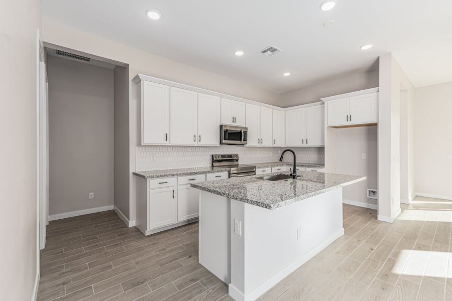 Furnished interior view inside a new home in Wildera, San Tan Valley (Image 4).