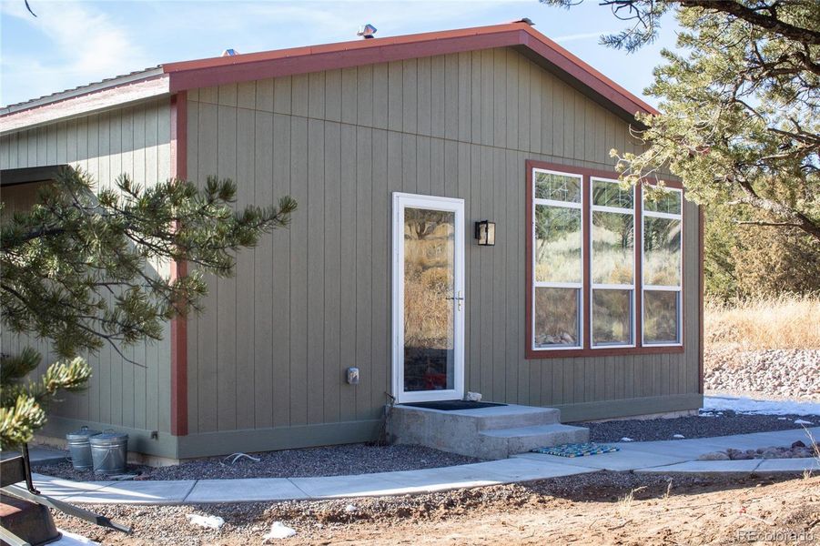 Front exterior of a new home in , Crestone, CO, highlighting curb appeal (Image 19).
