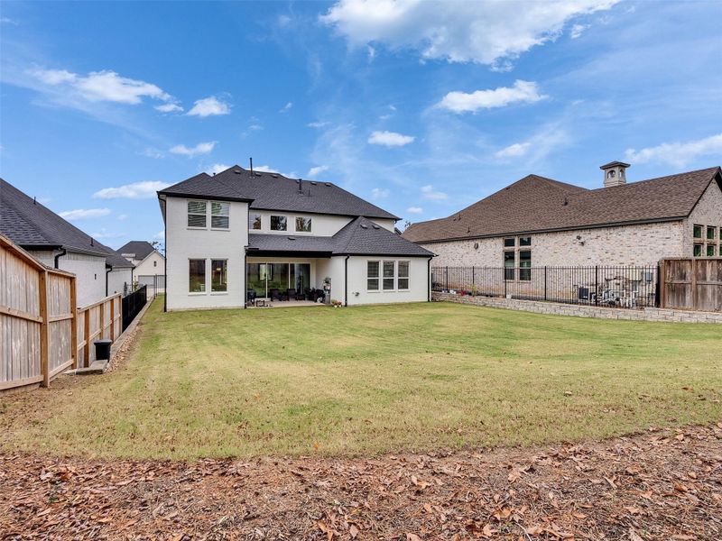 Exterior details and patio area of a home in , Conroe (Image 25). Exterior details and patio area of a home in , Conroe (Image 25).