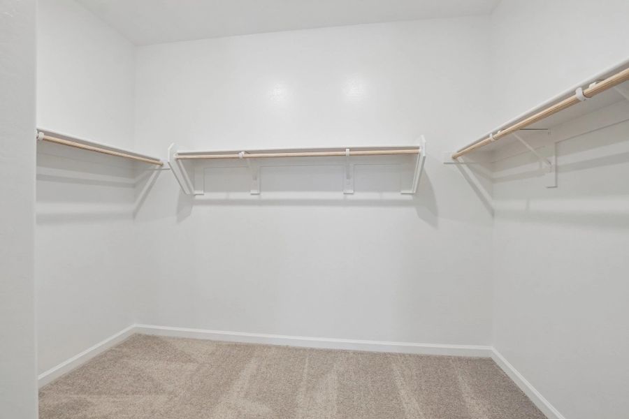 Primary walk in closet Primary walk in closet
