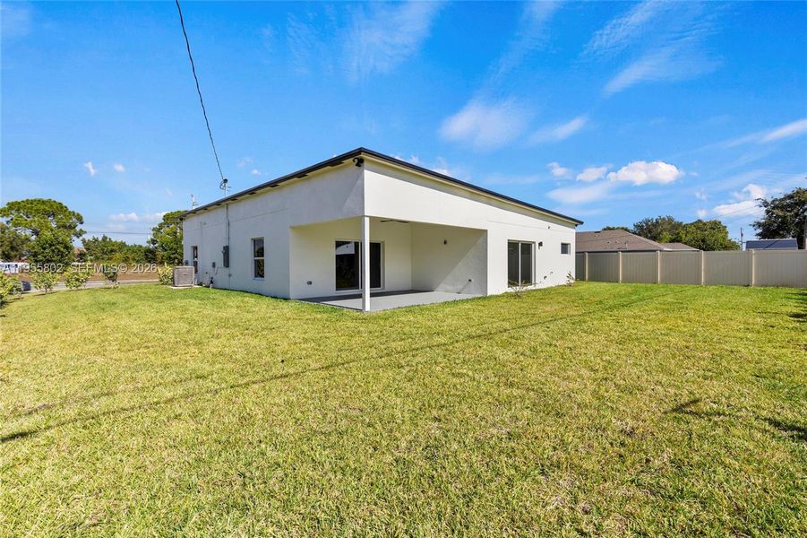 Exterior details and patio area of a home in , Port St. Lucie (Image 21).