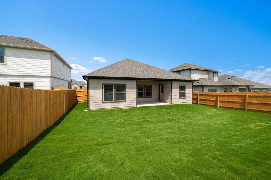 Rear of Home and Private Backyard