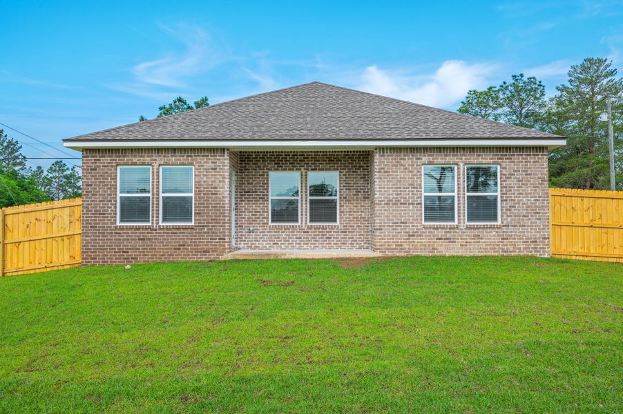 Exterior details and patio area of a home in Blossom Grove, Crestview (Image 18).