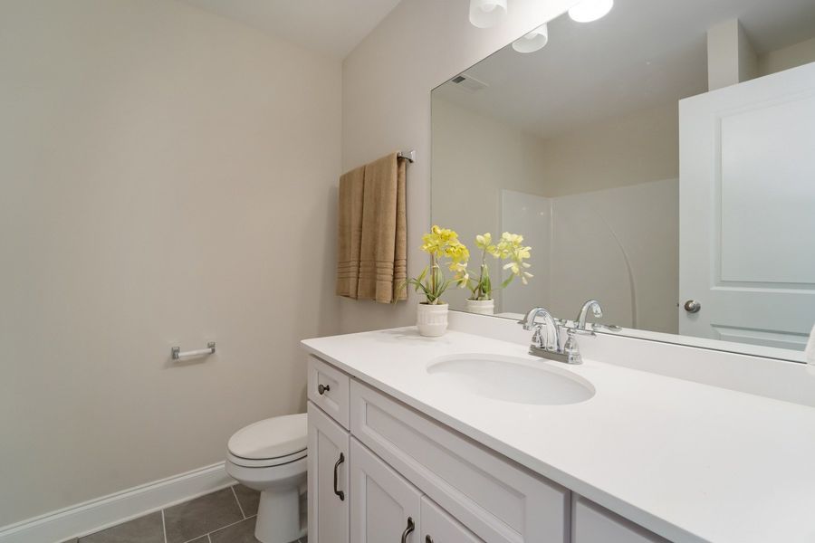 Representative furnished interior of a home built from the Harlow by Celebration Homes in Harvest Point, Spring Hill (Image 19).