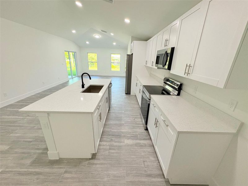 Furnished interior view inside a new home in , Okeechobee (Image 5).