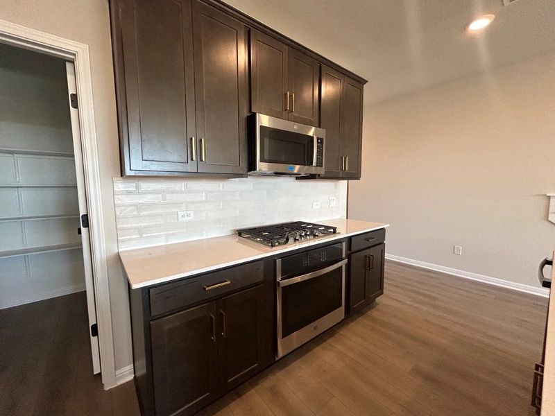 Furnished interior view inside a new home in Willow Springs, Buda (Image 7).