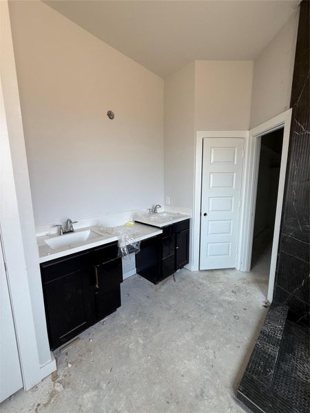 Double sinks with a convenient vanity area Double sinks with a convenient vanity area