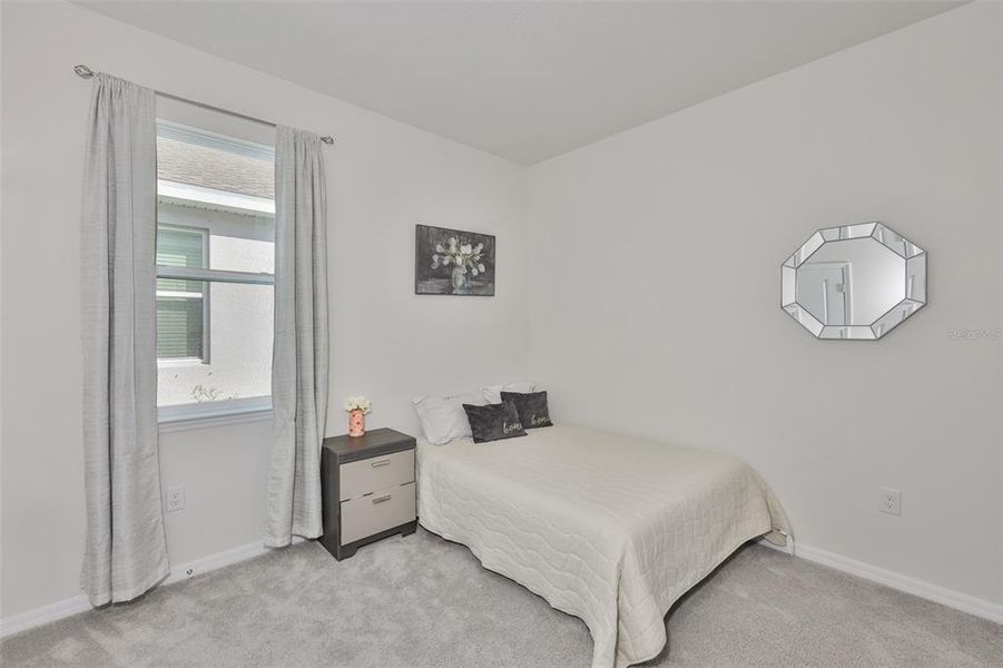 Furnished interior view inside a new home in Silverstone North, Palmetto (Image 33).