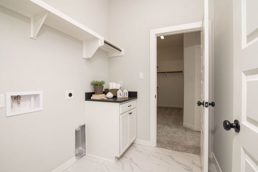Representative furnished interior of a home built from the The Laurel by Avonley Homes in Greens Prairie Reserve, College Station (Image 13).
