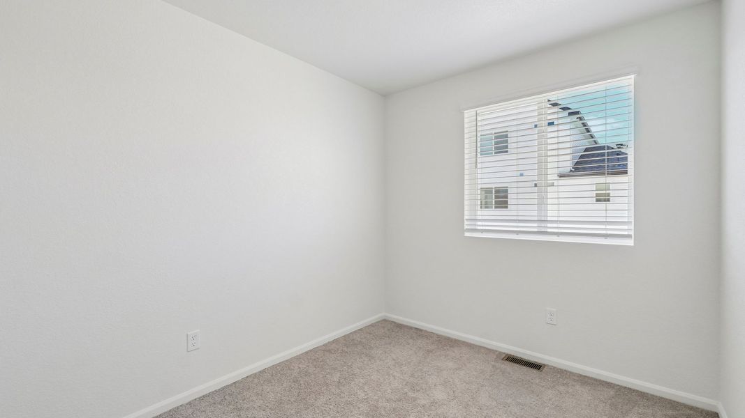 Spacious, unfurnished interior of a new home in Banning Lewis Ranch, Colorado Springs (Image 21).
