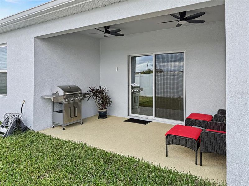 Exterior details and patio area of a home in Park Ridge Villas, Spring Hill (Image 24).