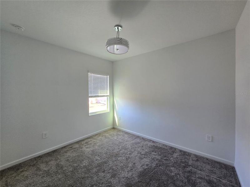 Spacious, unfurnished interior of a new home in Rhett's Ridge, Apopka (Image 28).