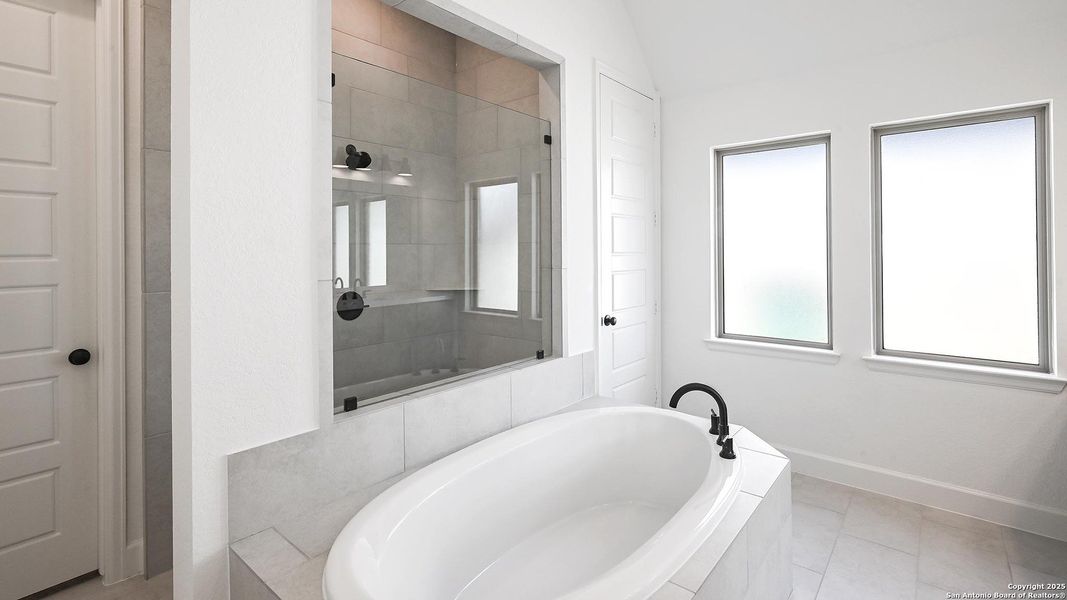 Furnished interior view inside a new home in Homestead 65', Schertz (Image 7).