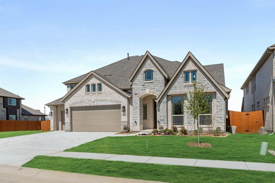 Front exterior of a new home in Glenwood Meadows, Argyle, TX, highlighting curb appeal (Image 2).