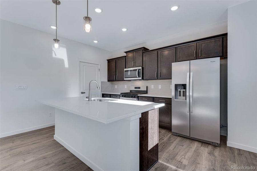 Furnished interior view inside a new home in Trails at Crowfoot, Parker (Image 8).