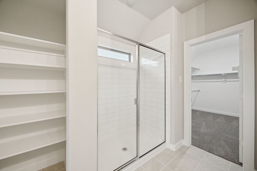 Primary Bathroom in the Oscar home plan by Trophy Signature Homes – REPRESENTATIVE PHOTO Primary Bathroom in the Oscar home plan by Trophy Signature Homes – REPRESENTATIVE PHOTO